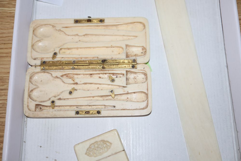 A Canton ivory card case, a page turner, a necessaire case and a pair of Japanese hardwood plaques